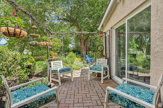 1411 S Utah St Unit 7, Salt Lake City, UT 84104 - view of patio / terrace featuring view of scattered trees