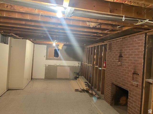 1136 E 3580 S, Millcreek, UT 84106 - basement featuring tile patterned floors and a brick fireplace