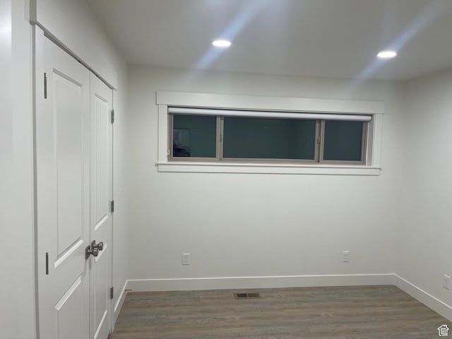1136 E 3580 S, Millcreek, UT 84106 - unfurnished bedroom with a closet, recessed lighting, wood finished floors, and baseboards
