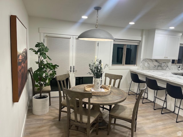 1136 E 3580 S, Millcreek, UT 84106 - dining area with light wood-style floors, recessed lighting, french doors, and baseboards