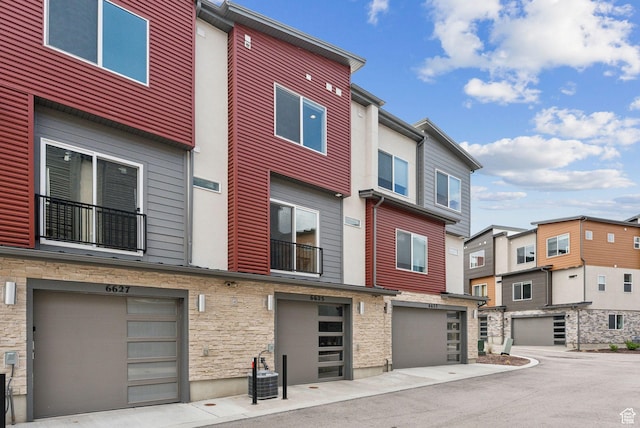 6625 Mountain Alder Way Unit 24, Park City, UT 84098 - view of property with central air condition unit, a residential view, and an attached garage