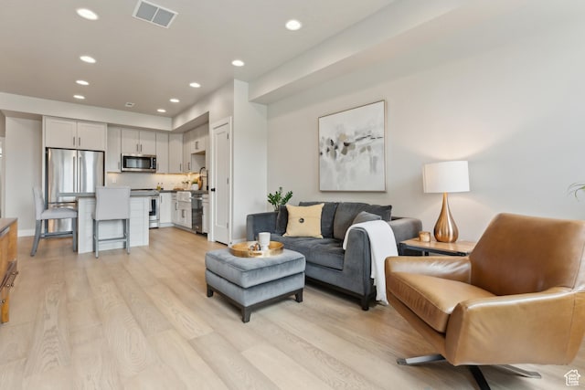6625 Mountain Alder Way Unit 24, Park City, UT 84098 - living room featuring light wood-style flooring and recessed lighting