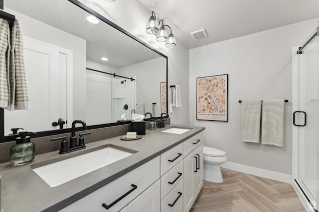6625 Mountain Alder Way Unit 24, Park City, UT 84098 - bathroom featuring a shower stall, toilet, baseboards, double vanity, and recessed lighting