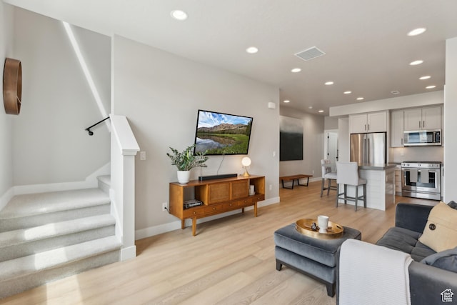 6625 Mountain Alder Way Unit 24, Park City, UT 84098 - living area with light wood-style flooring, stairway, recessed lighting, and baseboards