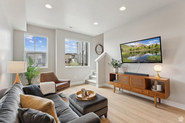 6625 Mountain Alder Way Unit 24, Park City, UT 84098 - living area featuring light wood finished floors, stairway, baseboards, and recessed lighting