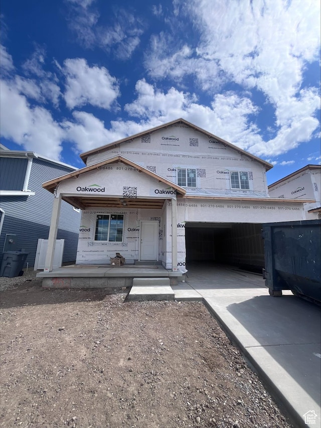 119 E Arcade Dr Unit 952, Saratoga Springs, UT 84045 - property under construction with driveway, a garage, and a porch