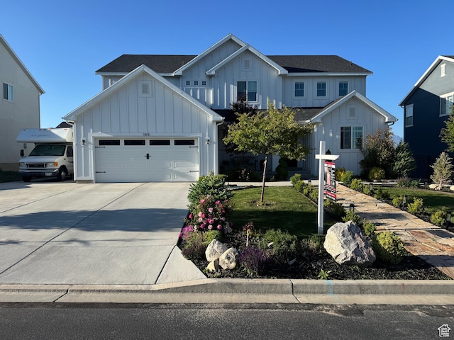 144 E Shorewood Dr S, Saratoga Springs, UT 84045 - modern farmhouse with board and batten siding, a garage, and driveway