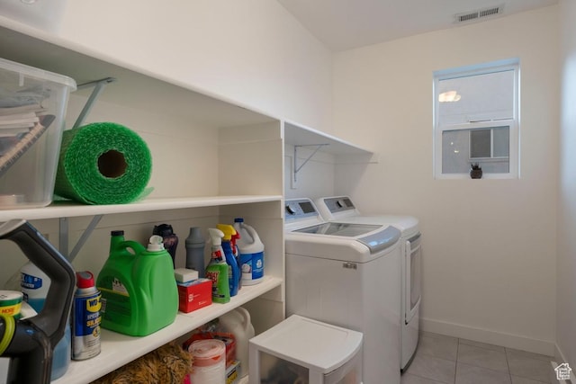 144 E Shorewood Dr S, Saratoga Springs, UT 84045 - washroom with separate washer and dryer, baseboards, and light tile patterned flooring