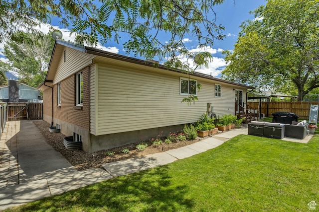 8328 S Grambling Way, Sandy, UT 84094 - view of side of home featuring outdoor lounge area and a patio area
