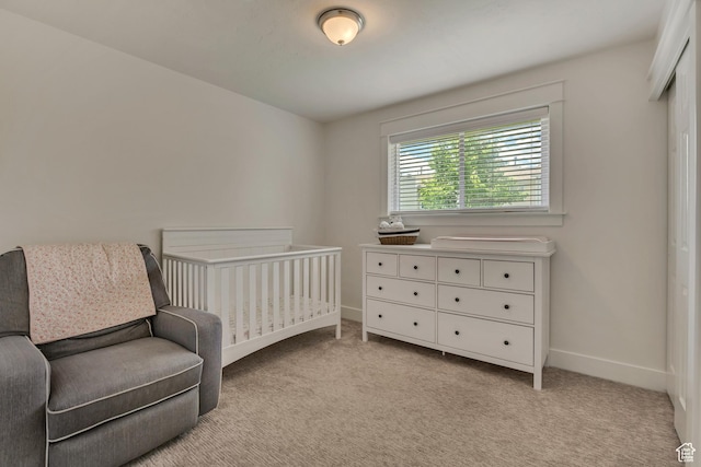 8328 S Grambling Way, Sandy, UT 84094 - bedroom with light colored carpet, baseboards, and a crib