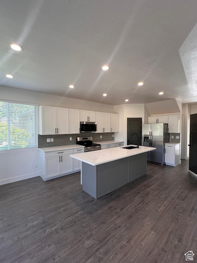 502 N 450 W, Orem, UT 84057 - kitchen with a sink, stainless steel appliances, dark wood finished floors, white cabinets, and a textured ceiling