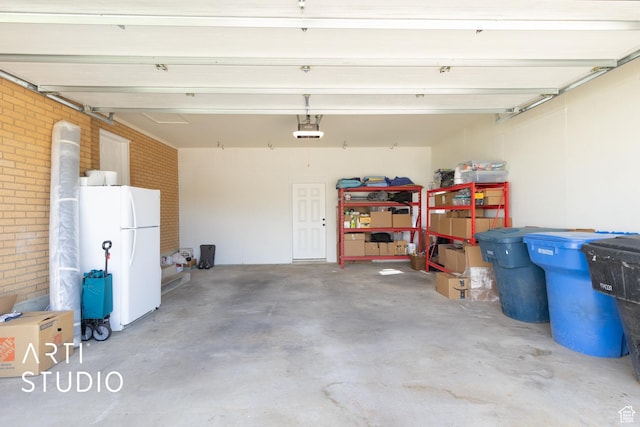 950 E 120 S, Orem, UT 84097 - garage with freestanding refrigerator and a garage door opener
