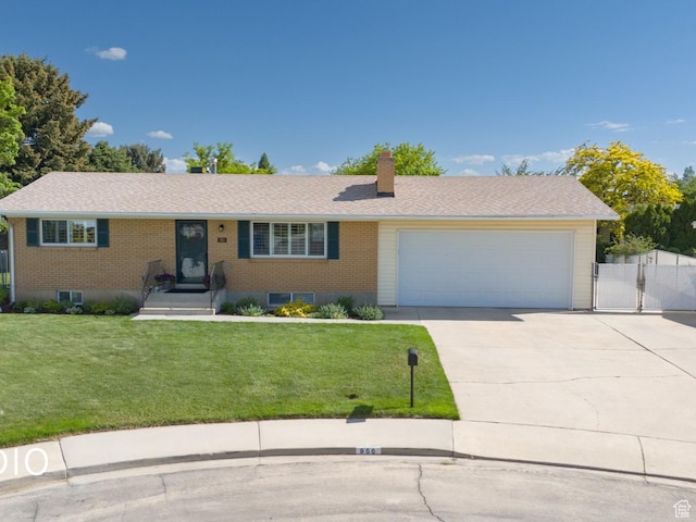 950 E 120 S, Orem, UT 84097 - single story home featuring brick siding, a garage, concrete driveway, a chimney, and a gate