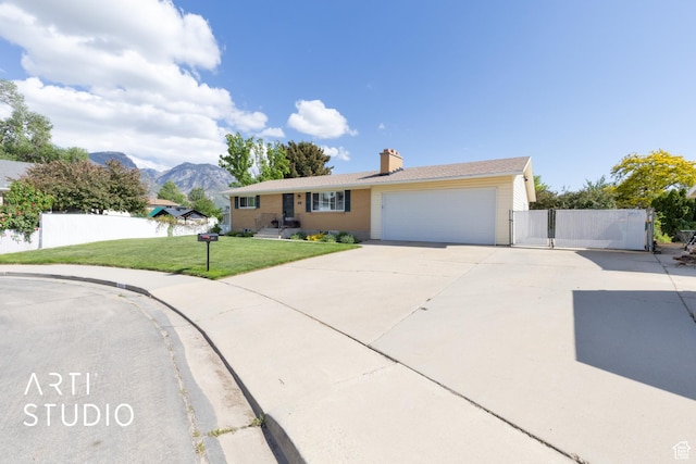 950 E 120 S, Orem, UT 84097 - single story home featuring driveway, a chimney, a gate, a garage, and a mountain view