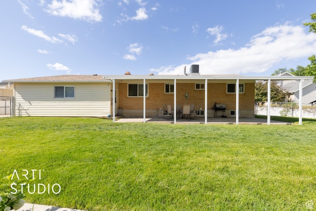 950 E 120 S, Orem, UT 84097 - rear view of property with brick siding and a patio area