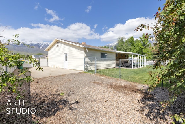 950 E 120 S, Orem, UT 84097 - view of home's exterior with a patio, driveway, and a mountain view