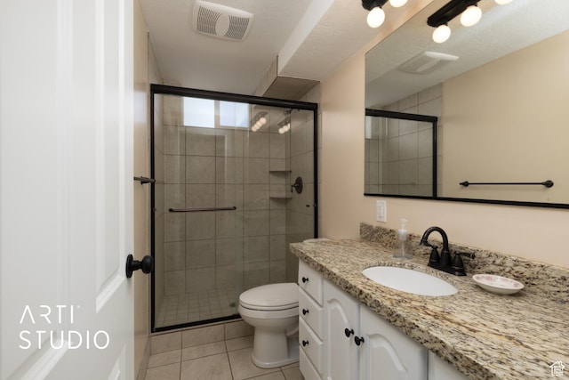 950 E 120 S, Orem, UT 84097 - full bath featuring a shower stall, tile patterned flooring, vanity, and toilet