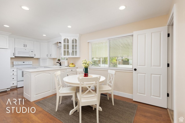 950 E 120 S, Orem, UT 84097 - dining area featuring recessed lighting, dark wood-type flooring, and baseboards