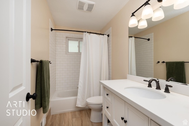 950 E 120 S, Orem, UT 84097 - bathroom featuring toilet, vanity, shower / bath combo with shower curtain, and wood finished floors