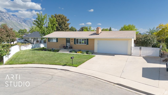 950 E 120 S, Orem, UT 84097 - single story home featuring a gate, driveway, an attached garage, a chimney, and brick siding