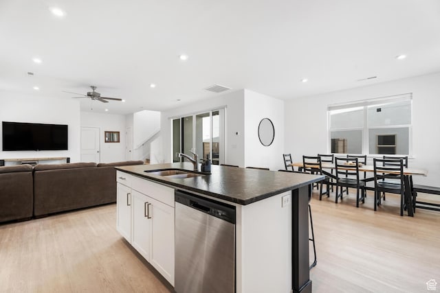 5670 S Carnelian Pkwy S, Bloomington, UT 84790 - kitchen with dishwasher, a sink, dark countertops, recessed lighting, and a kitchen island with sink
