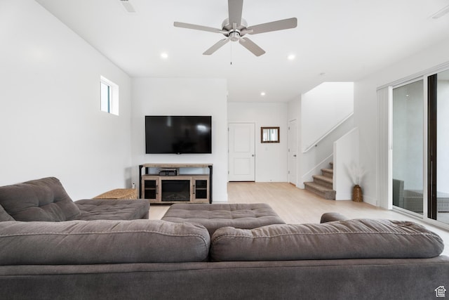 5670 S Carnelian Pkwy S, Bloomington, UT 84790 - living room featuring stairway, light wood-style floors, a ceiling fan, and recessed lighting