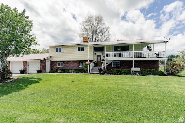 3704 S State St, Preston, ID 83263 - bi-level home featuring a garage, a chimney, a front lawn, brick siding, and metal roof