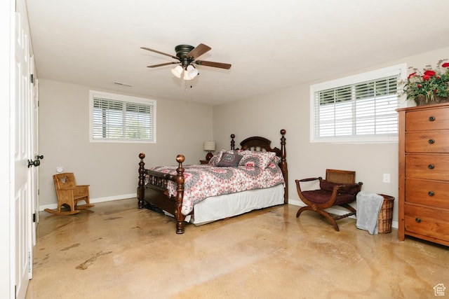 3704 S State St, Preston, ID 83263 - bedroom with finished concrete floors, baseboards, and a ceiling fan