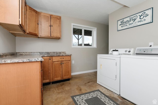 3704 S State St, Preston, ID 83263 - washroom featuring washing machine and dryer, cabinet space, and baseboards
