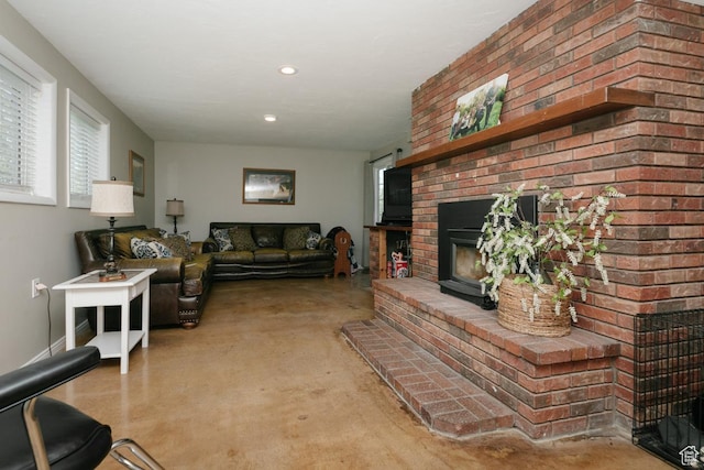 3704 S State St, Preston, ID 83263 - living area featuring concrete floors, a fireplace, and recessed lighting