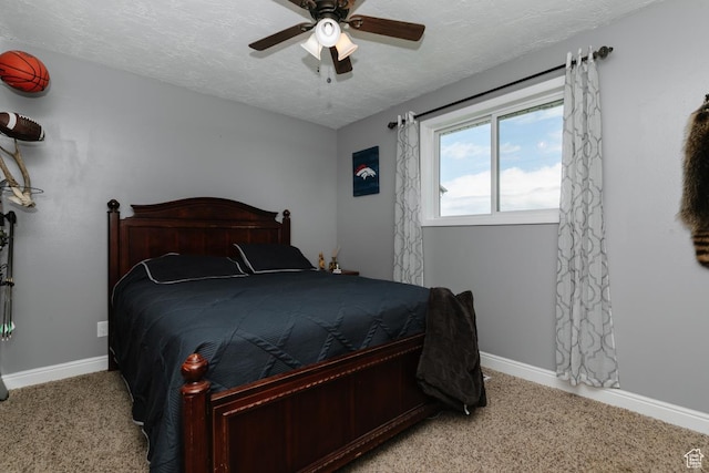 3704 S State St, Preston, ID 83263 - carpeted bedroom featuring baseboards, a textured ceiling, and a ceiling fan