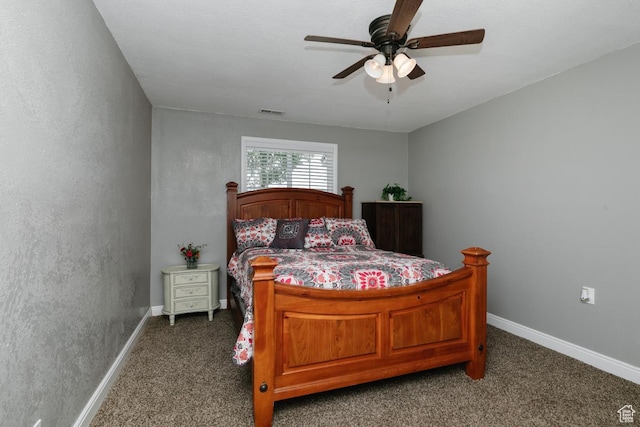 3704 S State St, Preston, ID 83263 - bedroom featuring dark carpet, baseboards, and ceiling fan