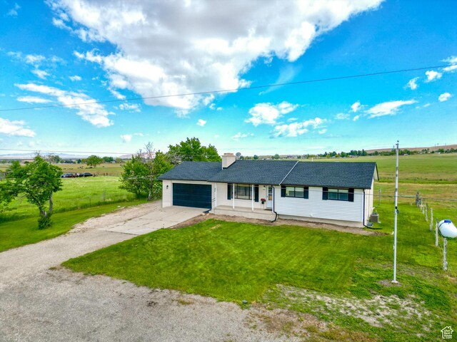 1491 Bryan Rd, Erda, UT 84074 - single story home featuring concrete driveway, an attached garage, and roof with shingles