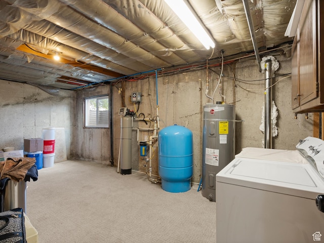1491 Bryan Rd, Erda, UT 84074 - below grade area with water heater, a water pressure tank, and washing machine and dryer