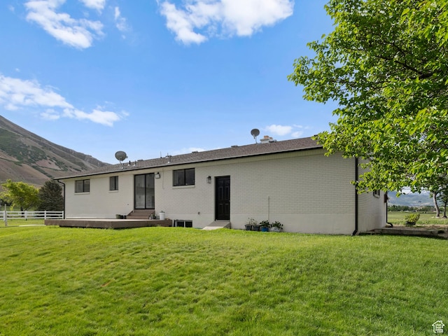 1491 Bryan Rd, Erda, UT 84074 - rear view of property with brick siding