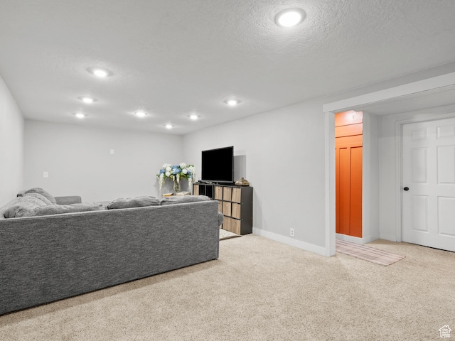 1491 Bryan Rd, Erda, UT 84074 - living area featuring recessed lighting, carpet, baseboards, and a textured ceiling