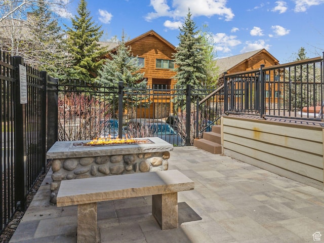 3975 Timberwolf Ln Unit 2C, Park City, UT 84098 - view of patio / terrace featuring a fire pit