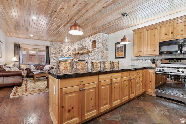 3975 Timberwolf Ln Unit 2C, Park City, UT 84098 - kitchen with gas stove, black microwave, wooden ceiling, a peninsula, and open floor plan