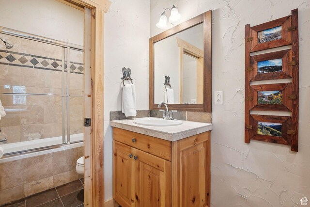 3975 Timberwolf Ln Unit 2C, Park City, UT 84098 - bathroom with tiled shower / bath combo, toilet, and vanity