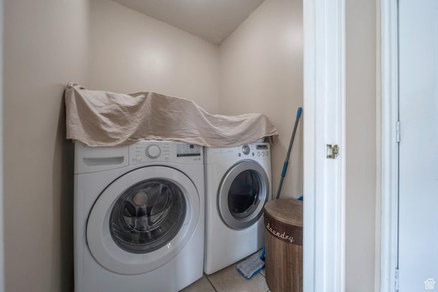 6216 S Waller Ln W, West Jordan, UT 84081 - laundry area featuring washer and dryer and light tile patterned floors