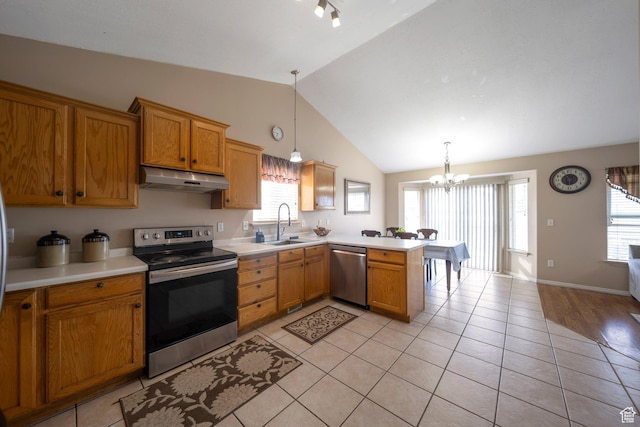 6216 S Waller Ln W, West Jordan, UT 84081 - kitchen with stainless steel appliances, under cabinet range hood, a peninsula, lofted ceiling, and light countertops