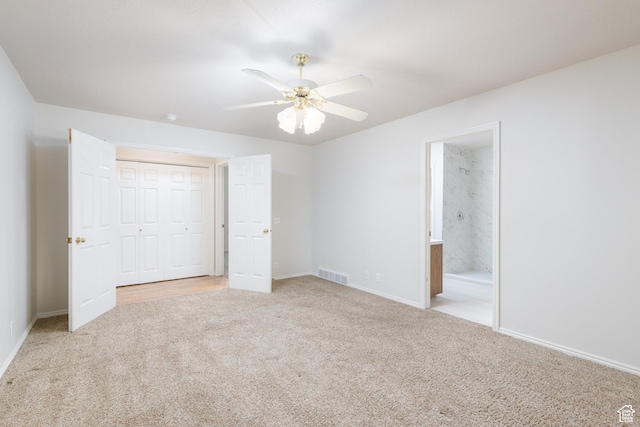 2275 W 1500 S Unit 28, Syracuse, UT 84075 - unfurnished bedroom with carpet flooring, baseboards, ensuite bath, and ceiling fan