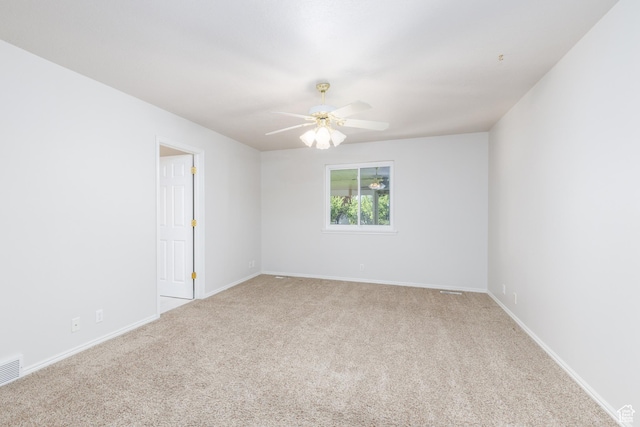 2275 W 1500 S Unit 28, Syracuse, UT 84075 - spare room featuring a ceiling fan, carpet flooring, and baseboards