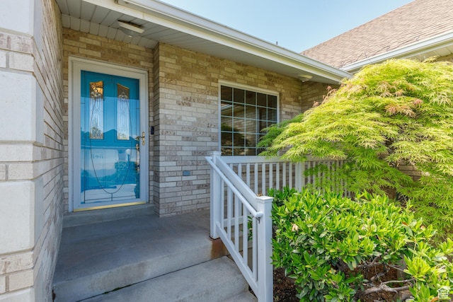 2275 W 1500 S Unit 28, Syracuse, UT 84075 - property entrance featuring brick siding and a porch