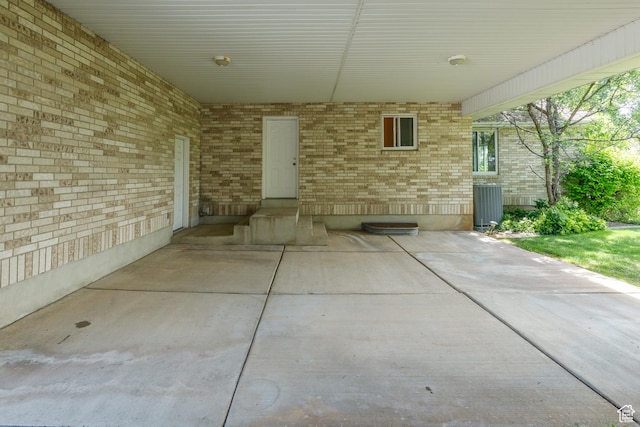 2275 W 1500 S Unit 28, Syracuse, UT 84075 - view of patio / terrace with an attached carport and central AC