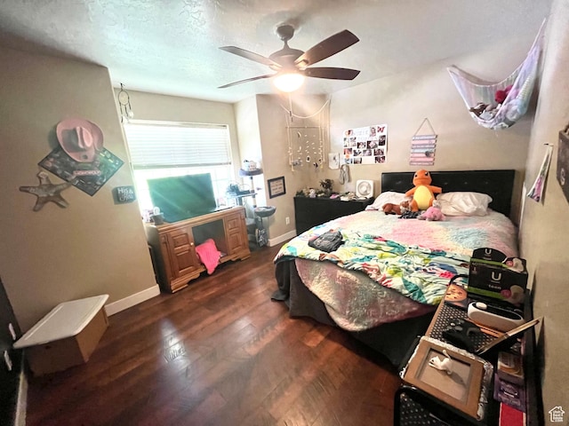 524 W 860 S, Tremonton, UT 84337 - bedroom featuring dark wood-type flooring, baseboards, and ceiling fan