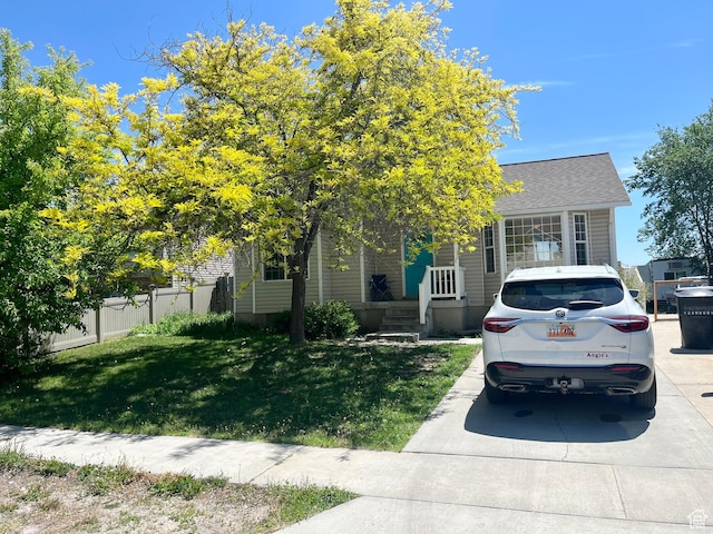 524 W 860 S, Tremonton, UT 84337 - obstructed view of property featuring roof with shingles
