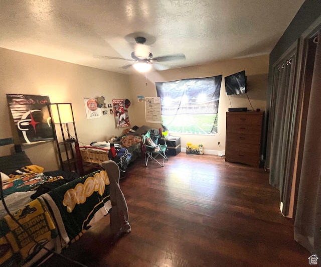 524 W 860 S, Tremonton, UT 84337 - bedroom featuring wood finished floors, a textured ceiling, and ceiling fan