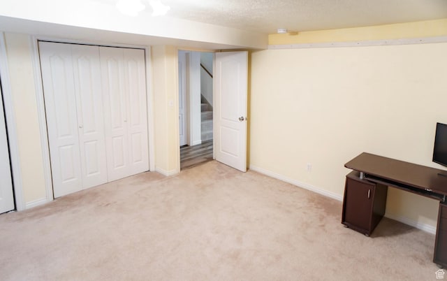 398 S 900 E, Smithfield, UT 84335 - finished basement with light colored carpet, stairs, baseboards, and a textured ceiling