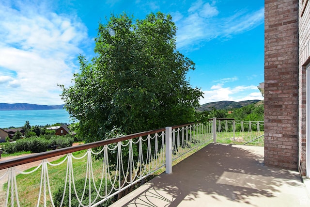 27 Lake W Cir, Fish Haven, ID 83287 - balcony featuring a water and mountain view